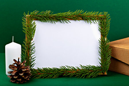 Mockup. Christmas. Blank photo frame mockup for design or advertising adorned with fresh pine...