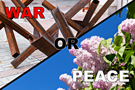 War or peace. Metal anti-tank hedgehogs on one side and vibrant lilac flowers against clear sky on other, symbolizing contrast between war and peace, death and lifeの写真素材