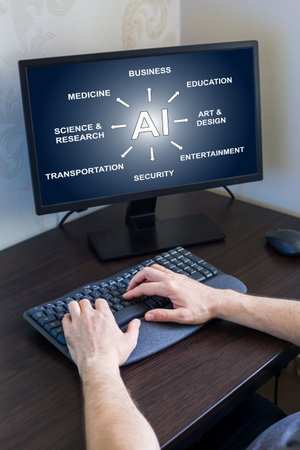 Remote work from home. Hands of an individual typing on keyboard in front of computer screen showcasing various applications of artificial intelligence, illustrating impact of technology. Verticallyの写真素材