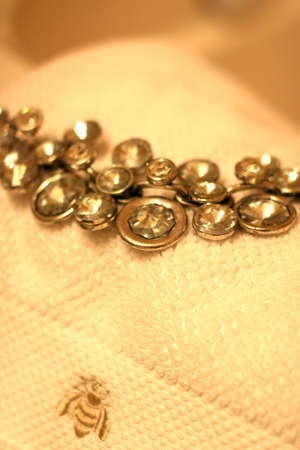 Stylish crystal necklace on white towel
