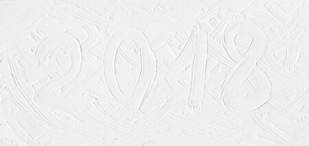 Template for the New Year's card of 2018. Texture of white paint with painted figures.の写真素材