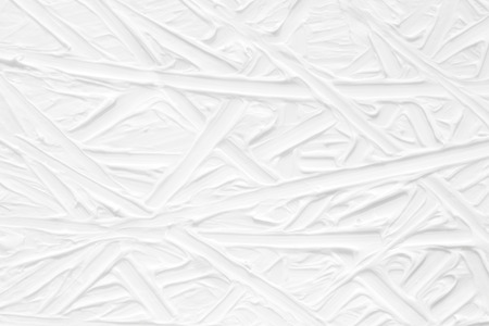 White background with a paint texture. Smears brush artist on the canvas with a pattern of stripes and intersections of infinite lines.の写真素材