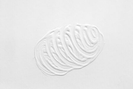 The texture of the paint is white. The background is drawn with a brush with a divorce on the wall.の写真素材