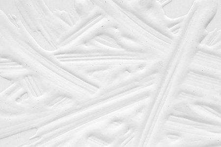 3 d texture of white paint with handmade brush strokes, decor elements for modern design. Abstract background for screensaver template and wedding card in gray gradient.の写真素材