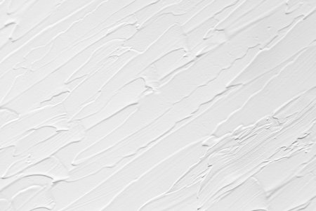<p>Texture of 3D paint with brush strokes, volumetric effect of a white canvas. Gray background to create a wedding cover or postcard, wallpaper on the wall.</p>の写真素材