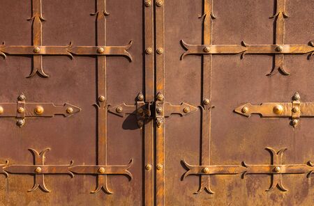 Old metal rusty door.の写真素材