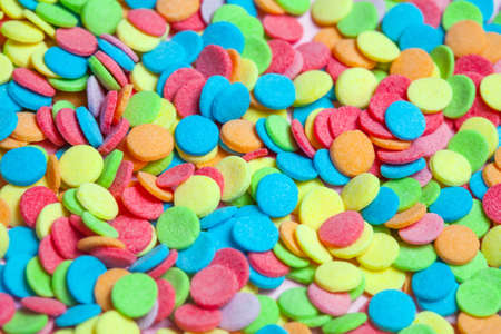 Macrophoto of colorful neon confectionery sprinkles candies for background use, top view. closeupの写真素材