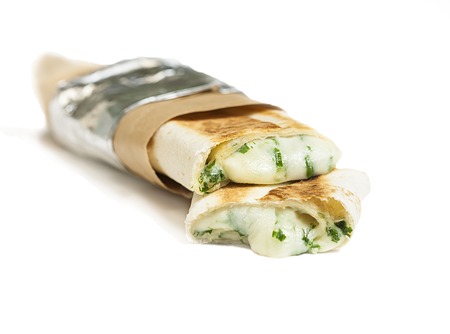 vegan shawarma or kebab with mozarella wrap with vegetables.の写真素材