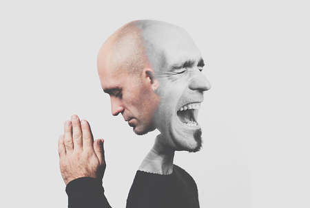 Screaming and stressed man in the merger with quiet prayer in double exposure. concept of duality.の写真素材