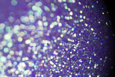 Ultra violet sparkle and stars background. Bright and festiveの写真素材