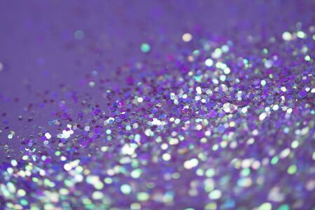 Ultra violet sparkle and stars background. Bright and festive.の写真素材
