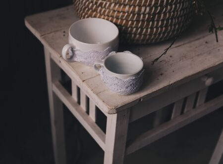 Two cups on old vintage table. Rustic style, country interriorの写真素材