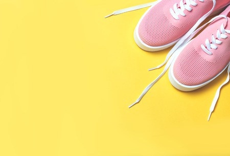 Pink decorative cosmetic on pink background.