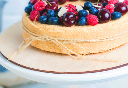 Macro photo of Cheesecake with summer berries. Close up