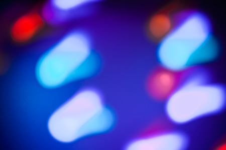 Magic lights christmas bokeh on black background. Can be used for your photos.の写真素材