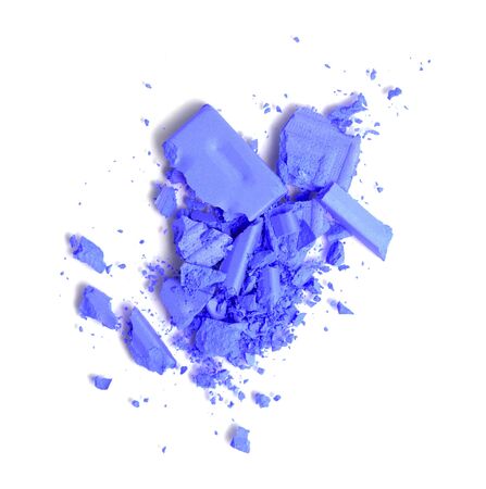 A broken blue gradient colored eye shadows isolated on a white background. Top view, flat lay. Copy space for your textの写真素材