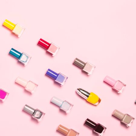 Colorful Nail polish bottles pattern background. Close up.の写真素材