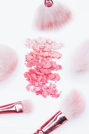 pink Eye shadow stroke and makeup brushesisolated on white background