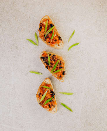 bruschetta with salmon on table. Flat lay, top view.