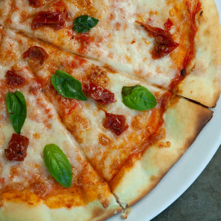 Margarita pizza flat lay. National italian cuisine.