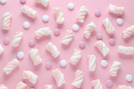candy and marshmallow, abstract pattern on pastel pink backgroundの写真素材
