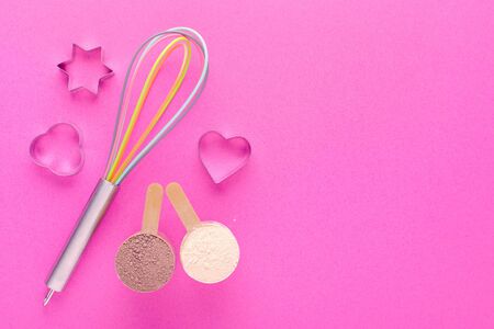 baking protein, fitness diet concept, pink background with copy spaceの写真素材