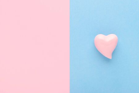 pink and blue background with a heart and copy spaceの写真素材