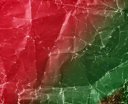 crumpled red green paperの写真素材