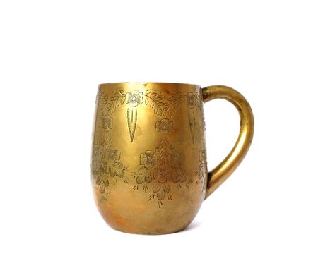 ancient bronze mug isolated on white backgroundの写真素材