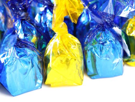 candy in foil isolatedの写真素材