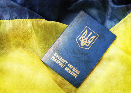 blue yellow flag and passport of Ukraine grunge style