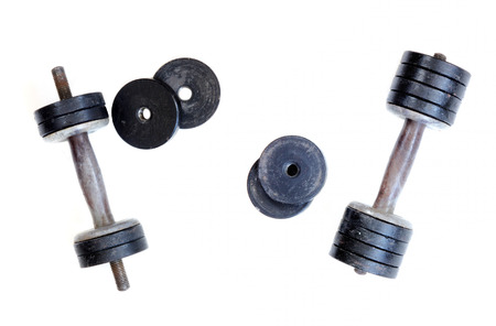 set of two old dumbells on whiteの写真素材