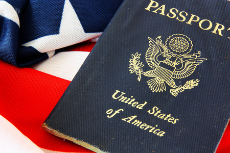 USA passport on The US flag backgroundの写真素材