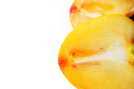 ripe sweet persimmon on white backgroundの写真素材