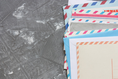 old envelopes and cards on concrete backの写真素材