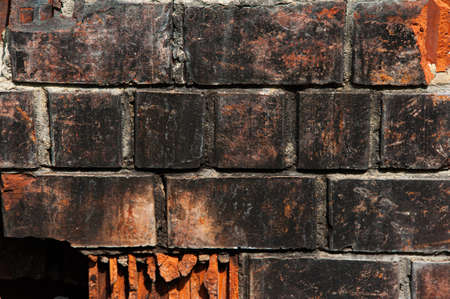 burnt red brick backgroundの写真素材