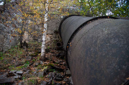 large metal pipe at a hydroelectric power plantの写真素材