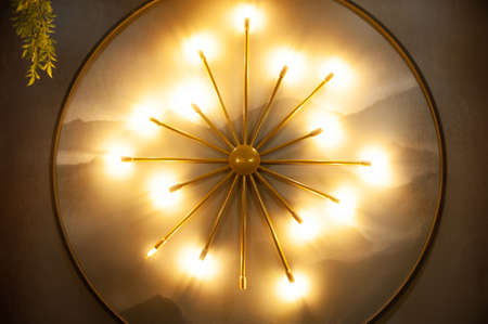 beautiful wall lamp. round wall lamp with powerful light, beautiful interior lighting solution for large roomsの写真素材