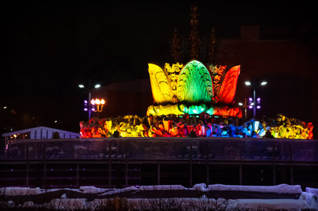Stone flower fountain Moscow at night with illuminationの写真素材
