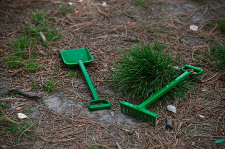 Garden tools on the ground in the park. Selective focus.の写真素材