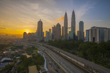 The view of sunrise over Kuala Lumpur city centre in the morning. Shot with Hitech GND0.6 filter.の写真素材