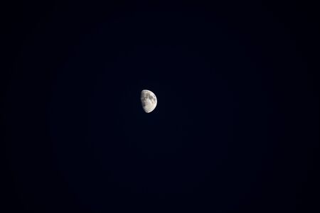 A gibbous moon During a clear night, can be Observed Their cratersの写真素材