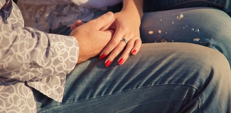 man and woman holding handsの写真素材