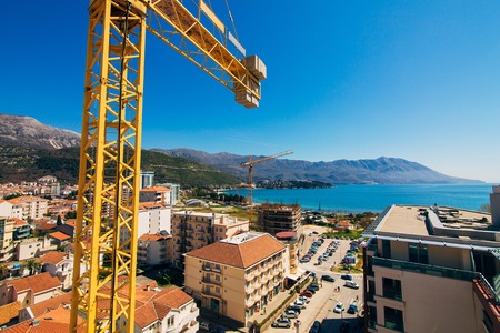 Budva building construction. Construction crane high-rise building in the center of Budva, Montenegroの写真素材