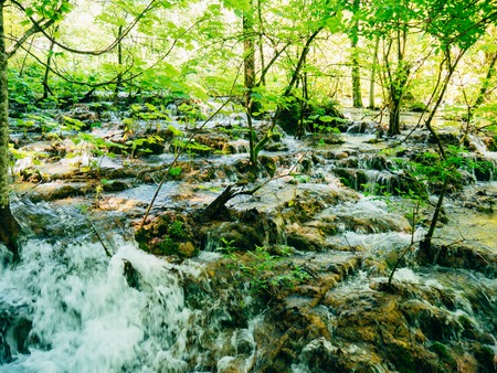 Waterfall in the national park Plitvice Lakes, Croatia. Waterfall in the forest.の写真素材