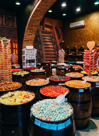 Shop of sweets. Candy in barrels. Candies of the same price. Shop of sweets in Croatia.の写真素材