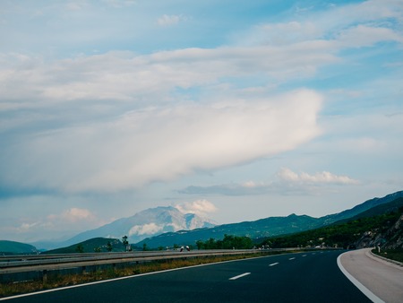 Highway. Motorway in Croatia. View of the car. The mountains and the horizon line at the backgroundの写真素材