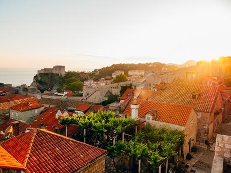 Dubrovnik Old Town, Croatia. Tiled roofs of houses. Church in the city. City View from the wall.の写真素材