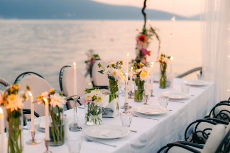 Wedding dinner by the sea. Wedding banquet at the sea. Donja Lastva, Montenegro, Tivat.の写真素材