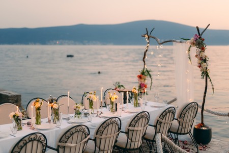 Wedding dinner by the sea. Wedding banquet at the sea. Donja Lastva, Montenegro, Tivat.の写真素材
